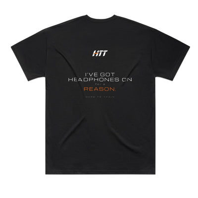 Back of a black HTT oversized tee printed I'VE GOT HEADPHONES ON FOR A REASON.