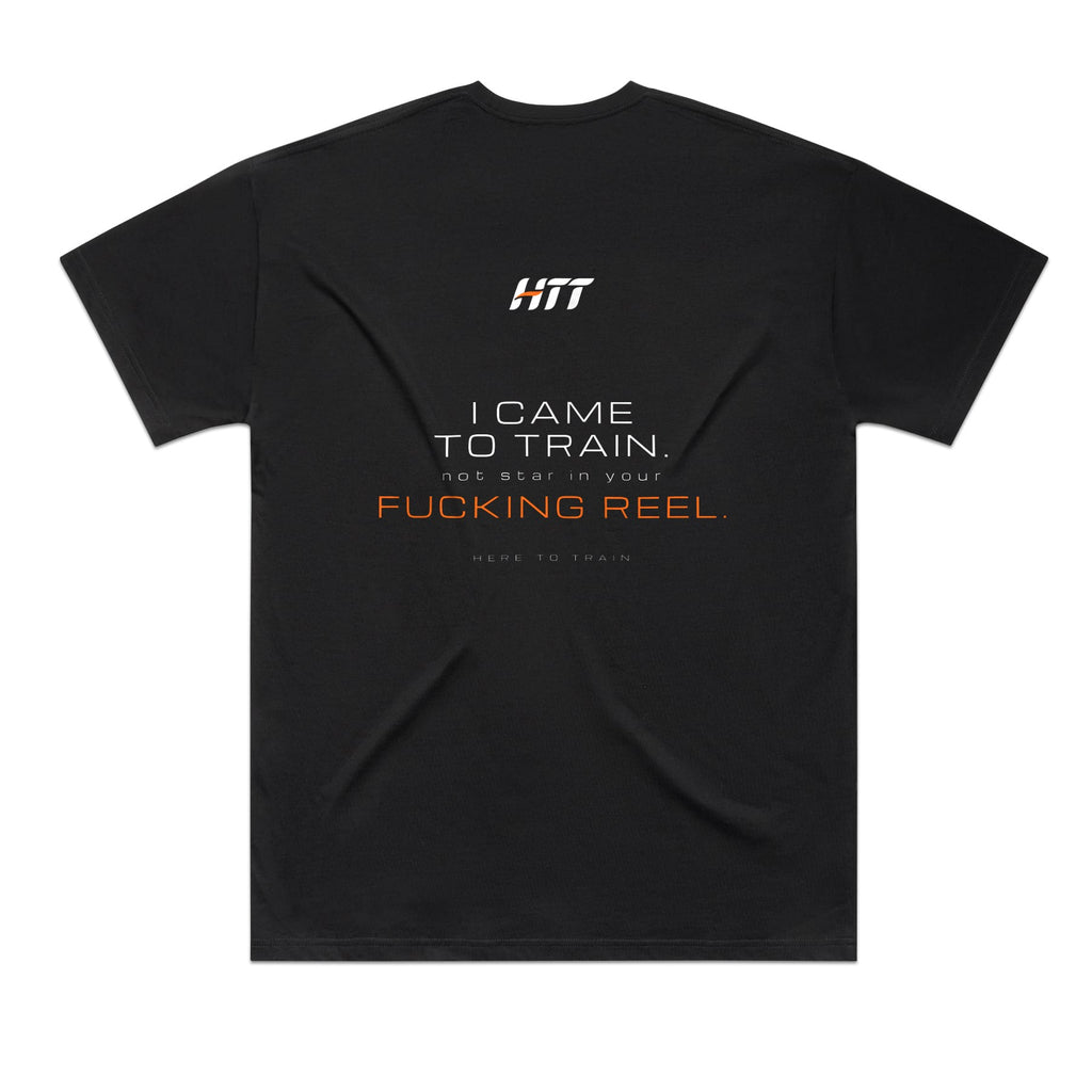 Back of a black HTT oversized tee printed I CAME TO TRAIN. NOT STAR IN YOUR F***ING REEL.
