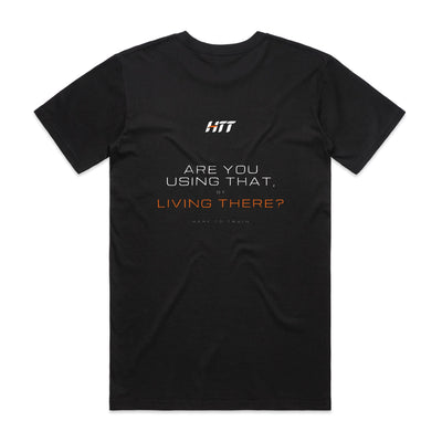Back of a black HTT standard fit tee printed ARE YOU USING THAT, OR LIVING THERE?