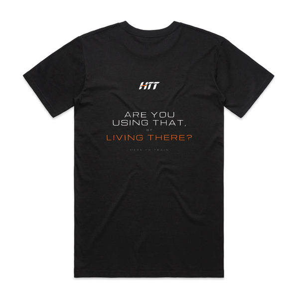 Back of a black HTT standard fit tee printed ARE YOU USING THAT, OR LIVING THERE?