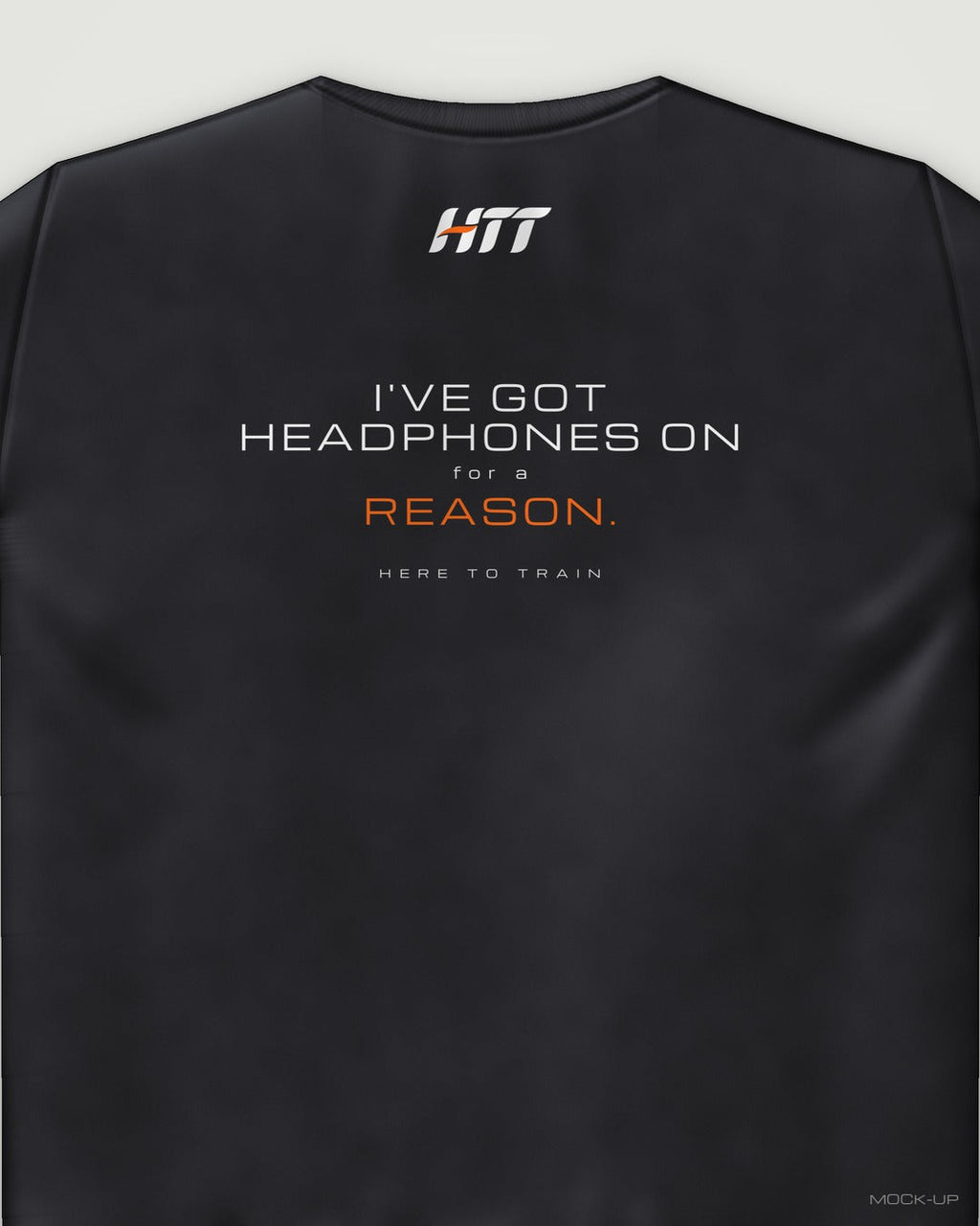 Back of a black HTT standard fit tee printed I'VE GOT HEADPHONES ON FOR A REASON. (portrait crop)
