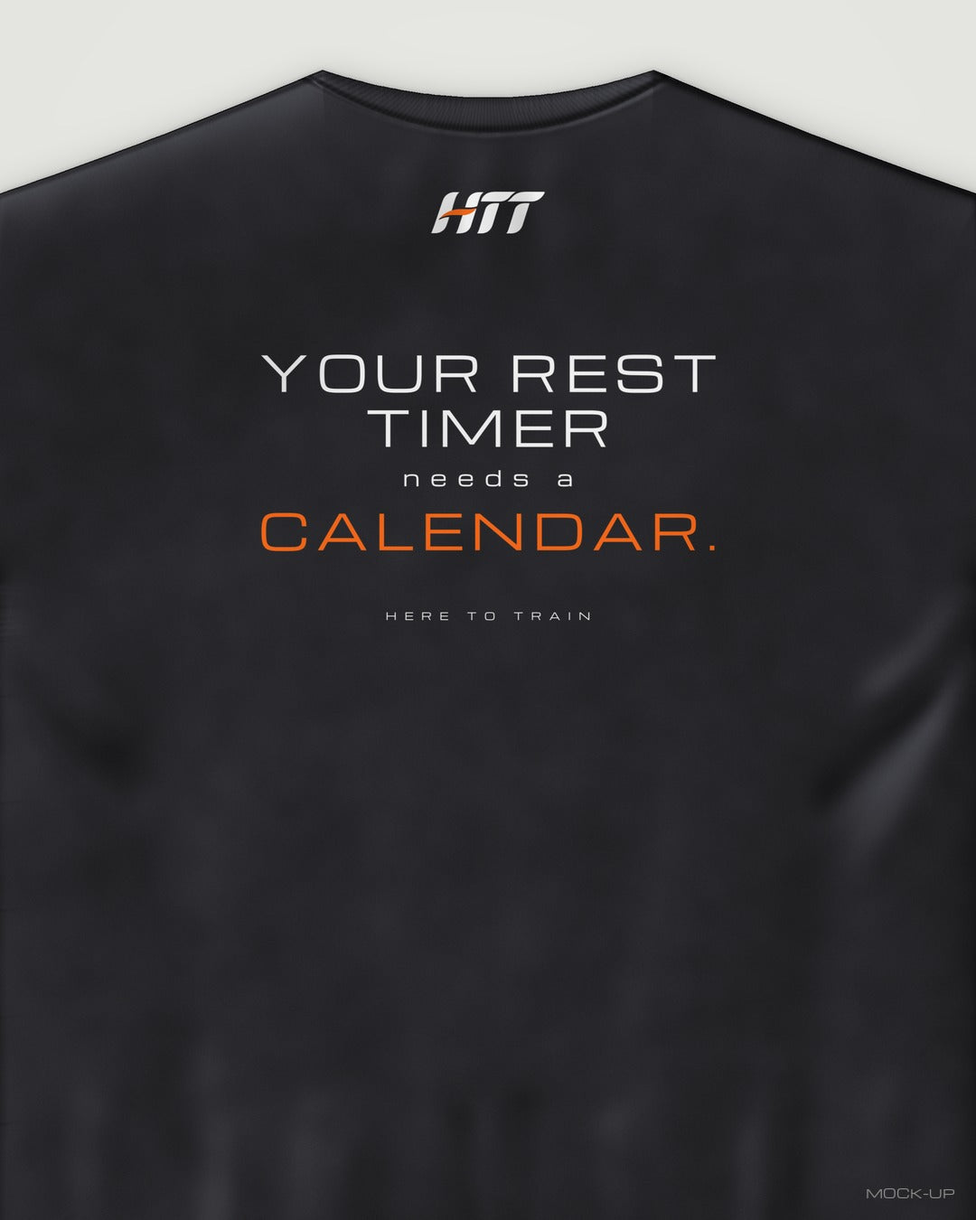 Back of a black HTT oversized tee printed YOUR REST TIMER NEEDS A CALENDAR. (portrait crop)