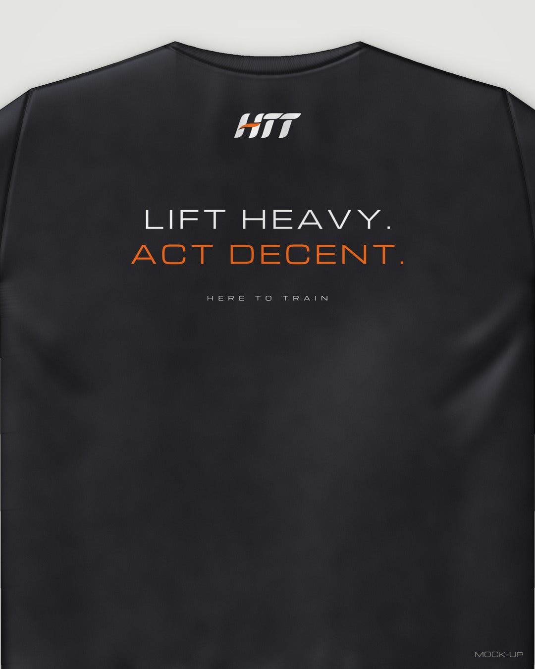 Back of a black HTT standard fit tee printed LIFT HEAVY. ACT DECENT. (portrait crop)