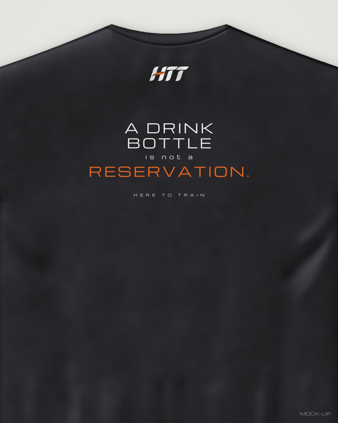 Back of a black HTT oversized tee printed A DRINK BOTTLE IS NOT A RESERVATION. (portrait crop)